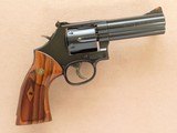 Smith & Wesson Model 586 Classic Distinguished Combat
Magnum, Cal. .357 Magnum, 4 Inch Barrel SOLD - 2 of 8