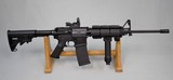 BUSHMASTER XM15-E2S AR15 .223 WITH RED DOT AND BIPOD - 1 of 17