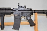 BUSHMASTER XM15-E2S AR15 .223 WITH RED DOT AND BIPOD - 7 of 17