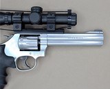 SMITH AND WESSON MODEL 617-6 WITH SCOPE, SPEED LOADED AND MATCHING BOX .22LR SOLD - 12 of 25