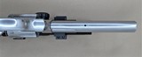 SMITH AND WESSON MODEL 617-6 WITH SCOPE, SPEED LOADED AND MATCHING BOX .22LR SOLD - 22 of 25