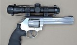 SMITH AND WESSON MODEL 617-6 WITH SCOPE, SPEED LOADED AND MATCHING BOX .22LR SOLD - 14 of 25