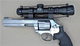 SMITH AND WESSON MODEL 617-6 WITH SCOPE, SPEED LOADED AND MATCHING BOX .22LR SOLD - 8 of 25