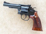 Smith & Wesson Model 15 Combat Masterpiece, Cal. .38 Special - 1 of 7