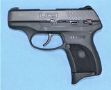 RUGER LC9 9MM WITH MATCHING BOX, POUCH AND ALL PAPERWORK **SOLD** - 7 of 15