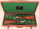 Arietta cased pair Model 802 SxS Shotguns **12 ga & 20 ga with leather attache case**