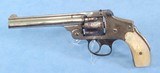 **SOLD**
Smith & Wesson Safety Hammerless 4th Model Revolver Chambered in .38 S&W **Break Action - Known as the Lemon Squeezer** - 1 of 11