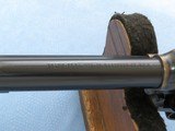 ** SOLD **
Colt New Frontier .22 Scout, MFG. 1984, Cal. .22 LR, 6 Inch Barrel ** Includes Factory Box and 22 Magnum Cylinder** - 16 of 22