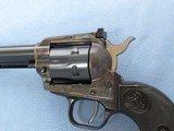 ** SOLD **
Colt New Frontier .22 Scout, MFG. 1984, Cal. .22 LR, 6 Inch Barrel ** Includes Factory Box and 22 Magnum Cylinder** - 12 of 22