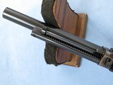 ** SOLD **
Colt New Frontier .22 Scout, MFG. 1984, Cal. .22 LR, 6 Inch Barrel ** Includes Factory Box and 22 Magnum Cylinder** - 22 of 22