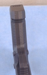 ARex Delta Pistol Chambered in 9mm **Box, Papers, 2 Mags, Cleaning Kit, Adjustable Grip Shims** - 11 of 15