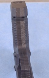 ARex Delta Pistol Chambered in 9mm **Box, Papers, 2 Mags, Cleaning Kit, Adjustable Grip Shims** - 13 of 15