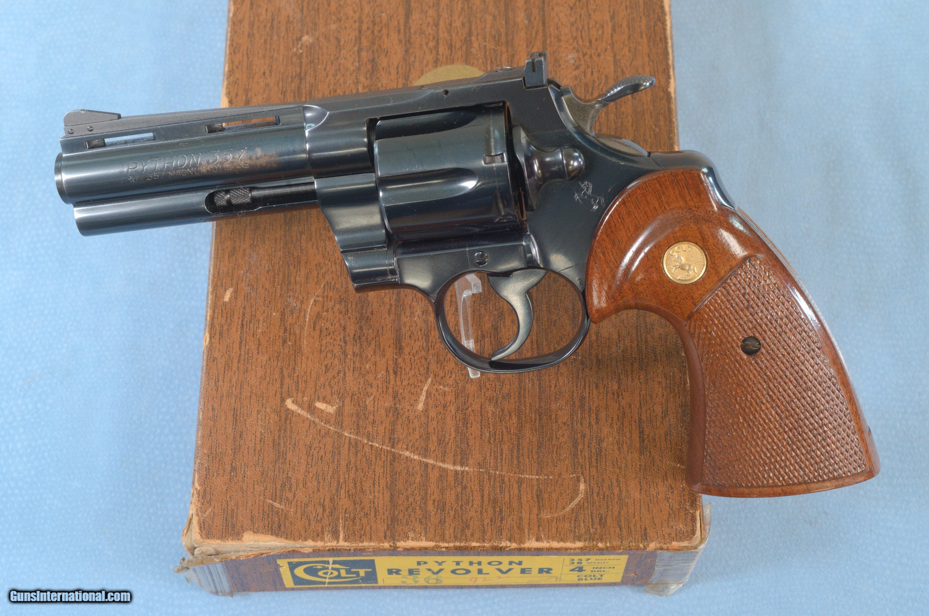 Colt Python Double Action Revolver Chambered in .357 Magnum Caliber **Mfg  1966 - Very Good Condition - 4 inch blued - Box+Papers** for sale