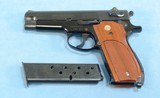 **SOLD**
Smith & Wesson Model 39-2 Semi Auto Pistol in 9mm **Mfg 1976 - 1st Gen Semi Auto - Box, Papers, Cleaning Items and 2 Magazines** - 18 of 19