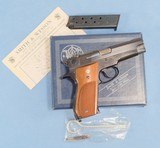 **SOLD**
Smith & Wesson Model 39-2 Semi Auto Pistol in 9mm **Mfg 1976 - 1st Gen Semi Auto - Box, Papers, Cleaning Items and 2 Magazines** - 1 of 19