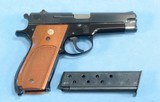 **SOLD**
Smith & Wesson Model 39-2 Semi Auto Pistol in 9mm **Mfg 1976 - 1st Gen Semi Auto - Box, Papers, Cleaning Items and 2 Magazines** - 19 of 19