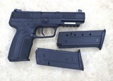 **SOLD** FNH Five-seven pistol with three magazines - 1 of 10