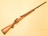 Custom Winchester Model 70, Octagon Barrel, Cal. 7mm Rem. Mag., 1949 Vintage, French Walnut Stock with Fleur-de-lis Checkering - 1 of 17