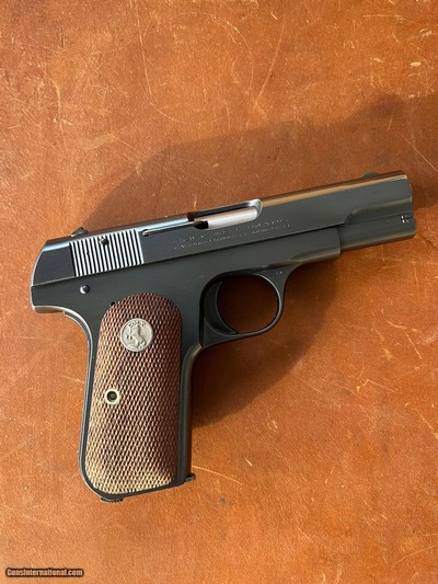 ULTRA RARE Dutch East Indies Pacific Theater shipped Colt 1903 POCKET HAMMERLESS. Boxed and factory lettered