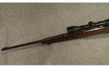 Winchester Model 88 lever action . 308
WIN. - 7 of 9