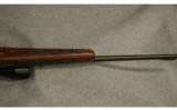 Winchester Model 88 lever action . 308
WIN. - 3 of 9
