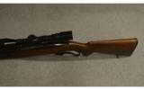 Winchester Model 88 lever action . 308
WIN. - 8 of 9