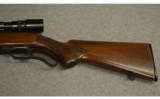 Winchester Model 88 lever action . 308
WIN. - 9 of 9