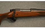 Remington 700 Wood .30 - 06 SPRG Rifle. - 2 of 9