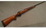 Remington 700 Wood .30 - 06 SPRG Rifle. - 1 of 9