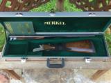 Merkel 147E 12 Gauge; 28" Barrels; Fixed Choke IC/M with Game Scene Engraved. - 1 of 15