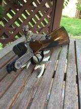 Merkel 147E 12 Gauge; 28" Barrels; Fixed Choke IC/M with Game Scene Engraved. - 2 of 15