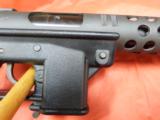 Intertec DC9 with extended barrel shroud -
- 9 of 11