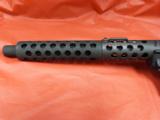 Intertec DC9 with extended barrel shroud -
- 4 of 11
