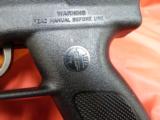 Intertec DC9 with extended barrel shroud -
- 6 of 11