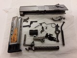 RUGER MODEL P95DC PISTOL 9MM PARTS PACKAGE W/MAGAZINE - 1 of 7