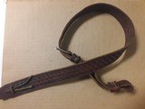 Lawrence
1-1/4" brown leather sling basket weave - 1 of 4