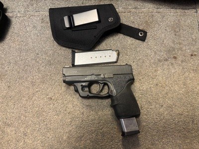 KAHR CW 40 WITH LASERMAX LASER SIGHT