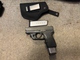 KAHR CW 40 WITH LASERMAX LASER SIGHT - 1 of 9
