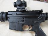 Bushmaster QRC AR-15 .223 / 5.56 Red Dot New 16" barrel
- 5 of 6