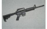 Bushmaster ~ XM15-E2S ~ NY Compliant ~ 5.56mm NATO - 1 of 9