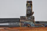 Dakota Arms Model 76 African 375 H&H Upgraded Stock Engraved Gold Inlaid Case Colored Talley Rings NEW!
- 14 of 24