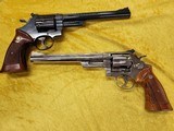 Gorgeous S&W Model 57 (No Dash) Revolvers in 41 Magnum, 8-3/8" Barrels. One High Polish Blue, One Shiny Nickel. - 1 of 12