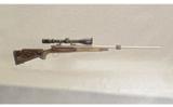 Remington Arms 700 Left-Hand .300 RUM - 1 of 9