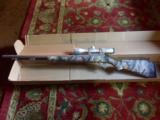 Thompson/Center Arms .50 CAL Muzzleloader with Nikon Omega 3x9 scope - 2 of 9