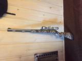 Thompson/Center Arms .50 CAL Muzzleloader with Nikon Omega 3x9 scope - 1 of 9