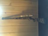 Thompson/Center Arms .50 CAL Muzzleloader with Nikon Omega 3x9 scope - 6 of 9