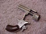 Very Rare Osgood Duplex Revolver;Main Barrel is .38
Caliber, With an 8 shot(.22 cal.) Around It. - 4 of 4