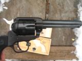 COLT - FRONTIER SCOUT REVOLVER WITH DUAL CYLINDER.
CALIBERS .22 L.R. & .22 MAG.
- 3 of 6
