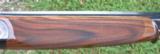 B, RIZZINI - 20 ga. OVER/UNDER SIDEPLATED BOXLOCK - CASE COLORED GAME SCENE ENGRAVED -
29 1/4" SOLID RIB
- 8 of 11