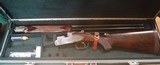 BERETTA -GALLERY EDITIONMOD. 687EELLO/U - 12 GAUGE -28 INCH VENT RIB BARRELS WITH TWO BERETTA CHOKE TUBES - HIGHLY FIGURED PISTOL GRIP STOCK - 1 of 11